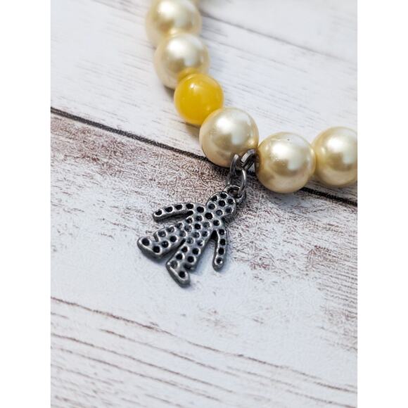 Vintage Stretch Bracelet - Cream & Yellow with Man Charm - Picture 2 of 5